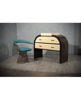 Sinuous shapes for this fine piece of furniture from the first half of the 20th century