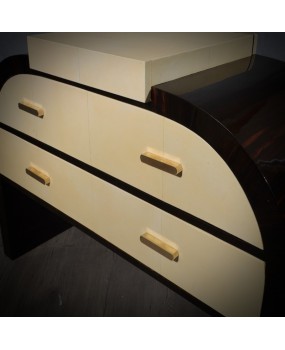 Sinuous shapes for this fine piece of furniture from the first half of the 20th century