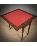 T 119 Tavolino da gioco lastronato in legno di mogano